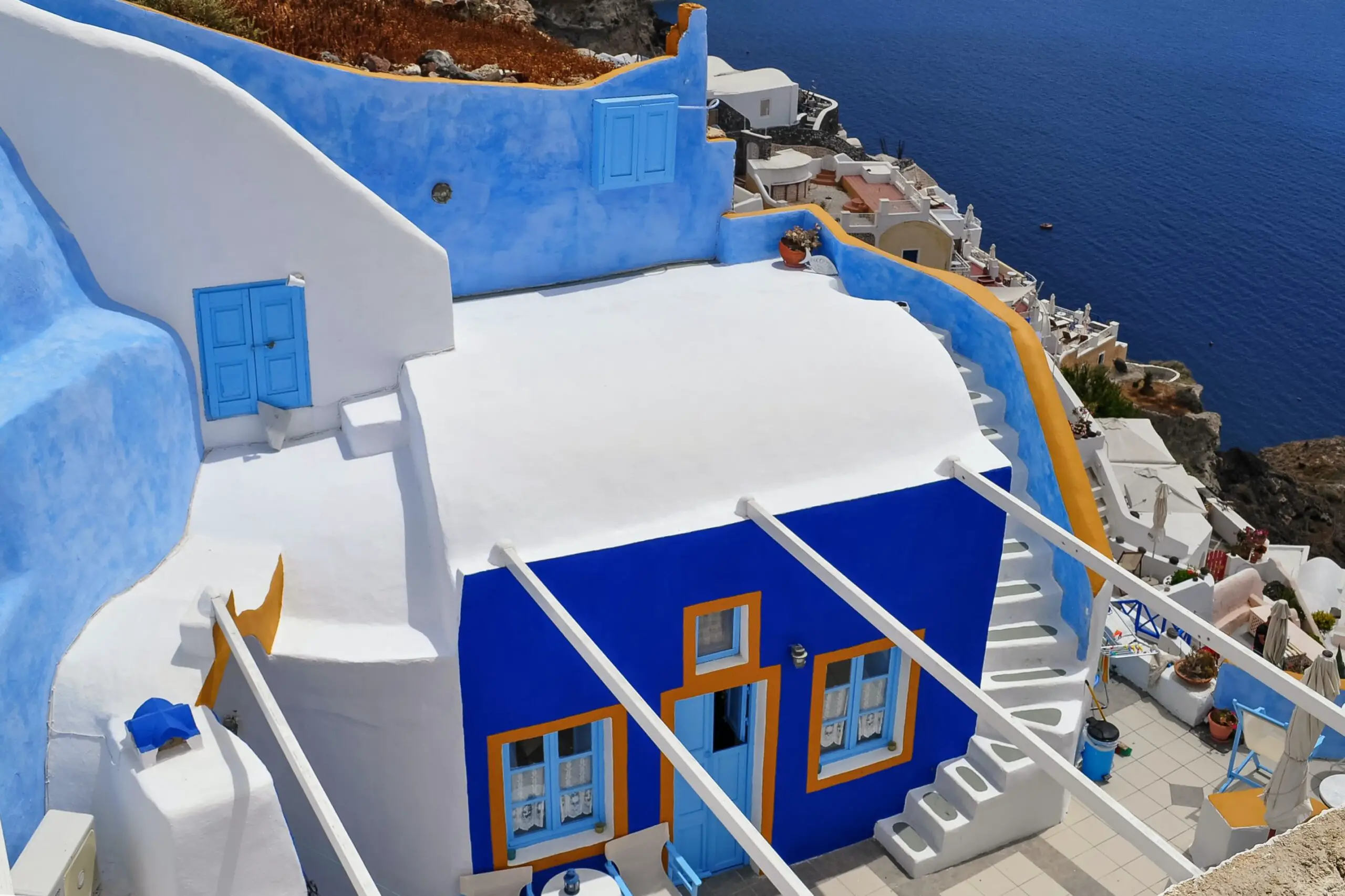 Por qué las casas construidas en las islas griegas son de color azul y blanco